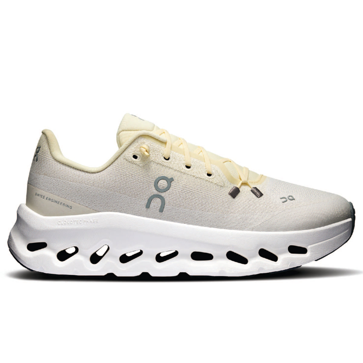 On Cloudtilt sneakers in a cream and white