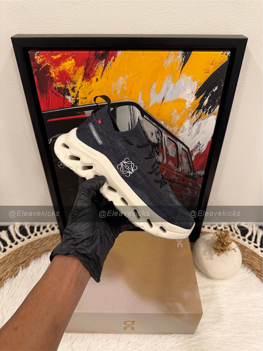 On Cloudtilt sneaker in black and asphalt.